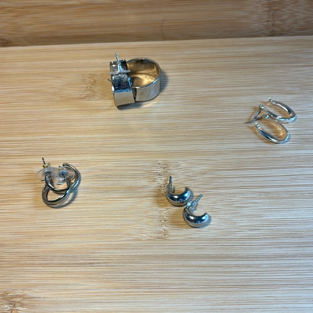 Bundle of 4 pairs silver hoops.